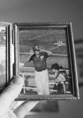 old photograph of man in baseball uniform